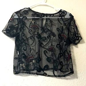 Black mesh crop top with floral design